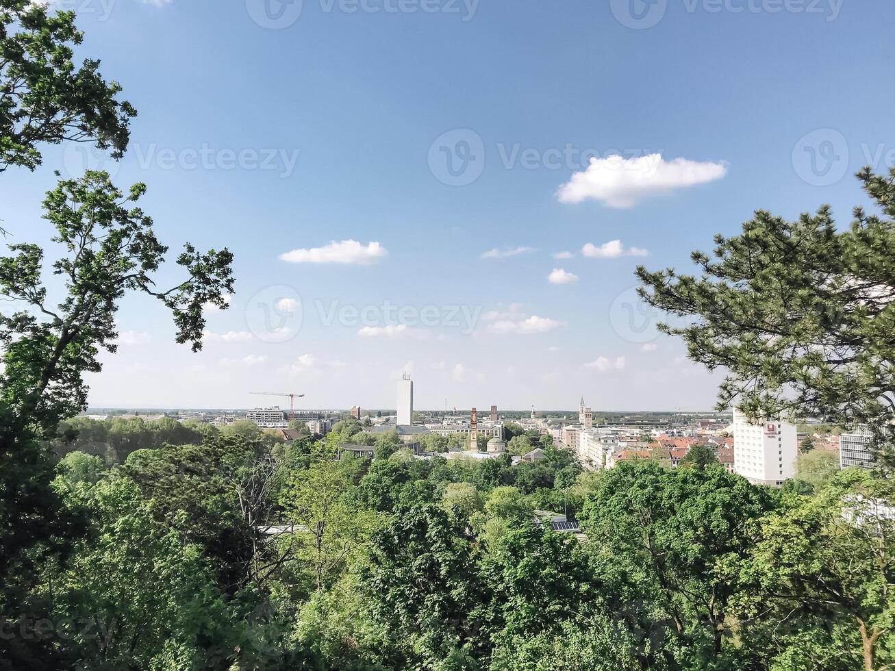 A beautiful view of a city with a large building in the background photo