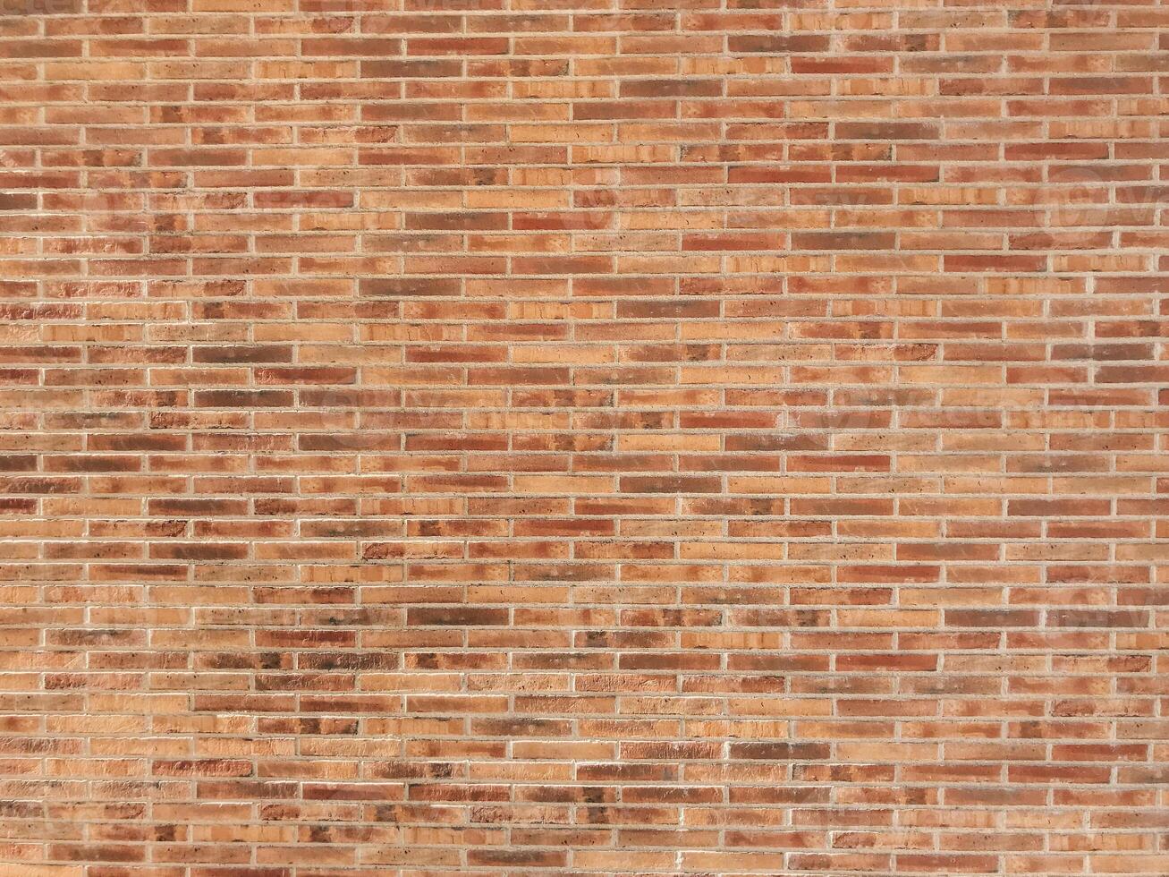 Brick wall with a red brick pattern photo