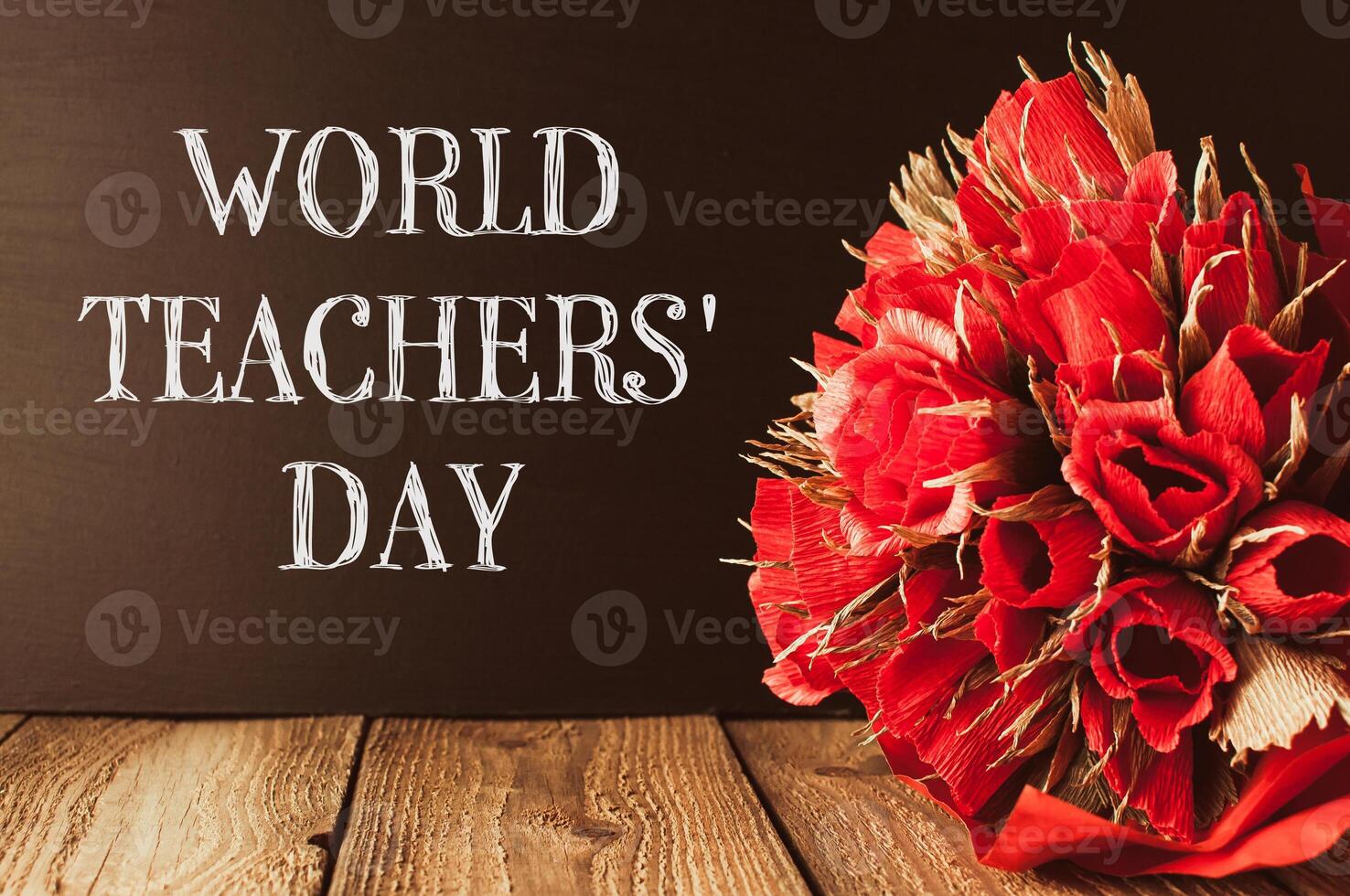 a wooden table with the words World Teachers' Day photo
