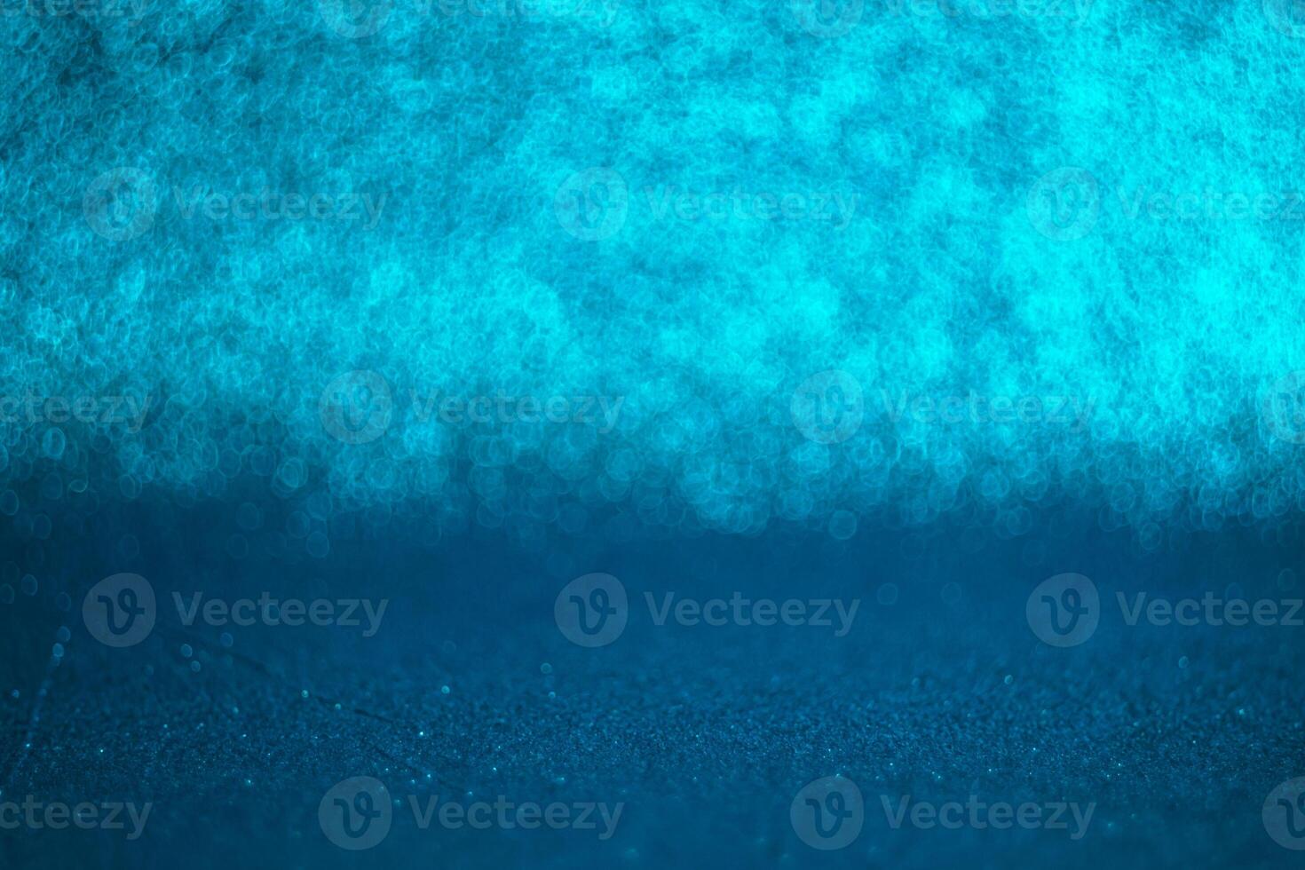 A blue background with a blurry blue sky photo