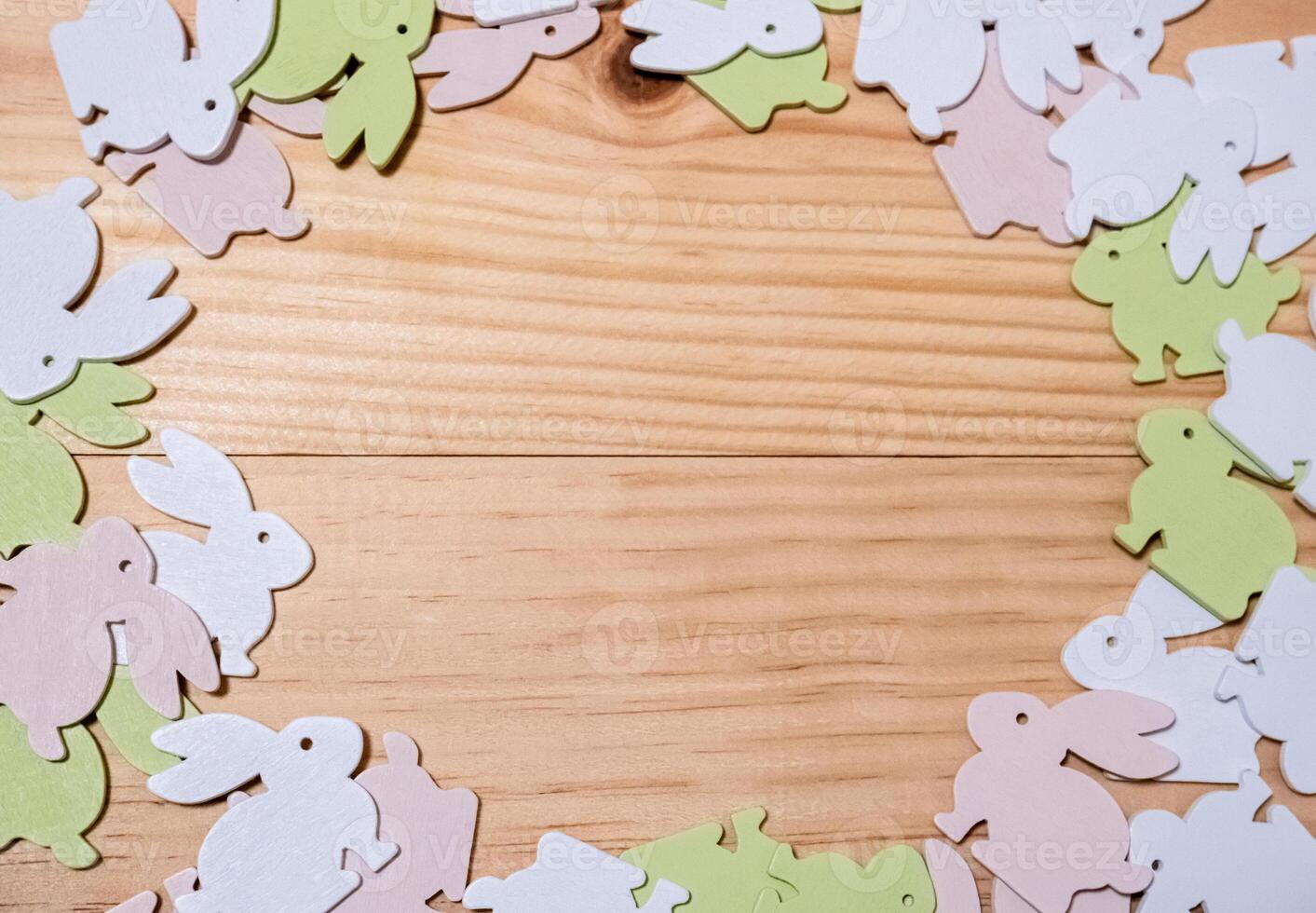 Wooden frame with a bunch of rabbits in it photo