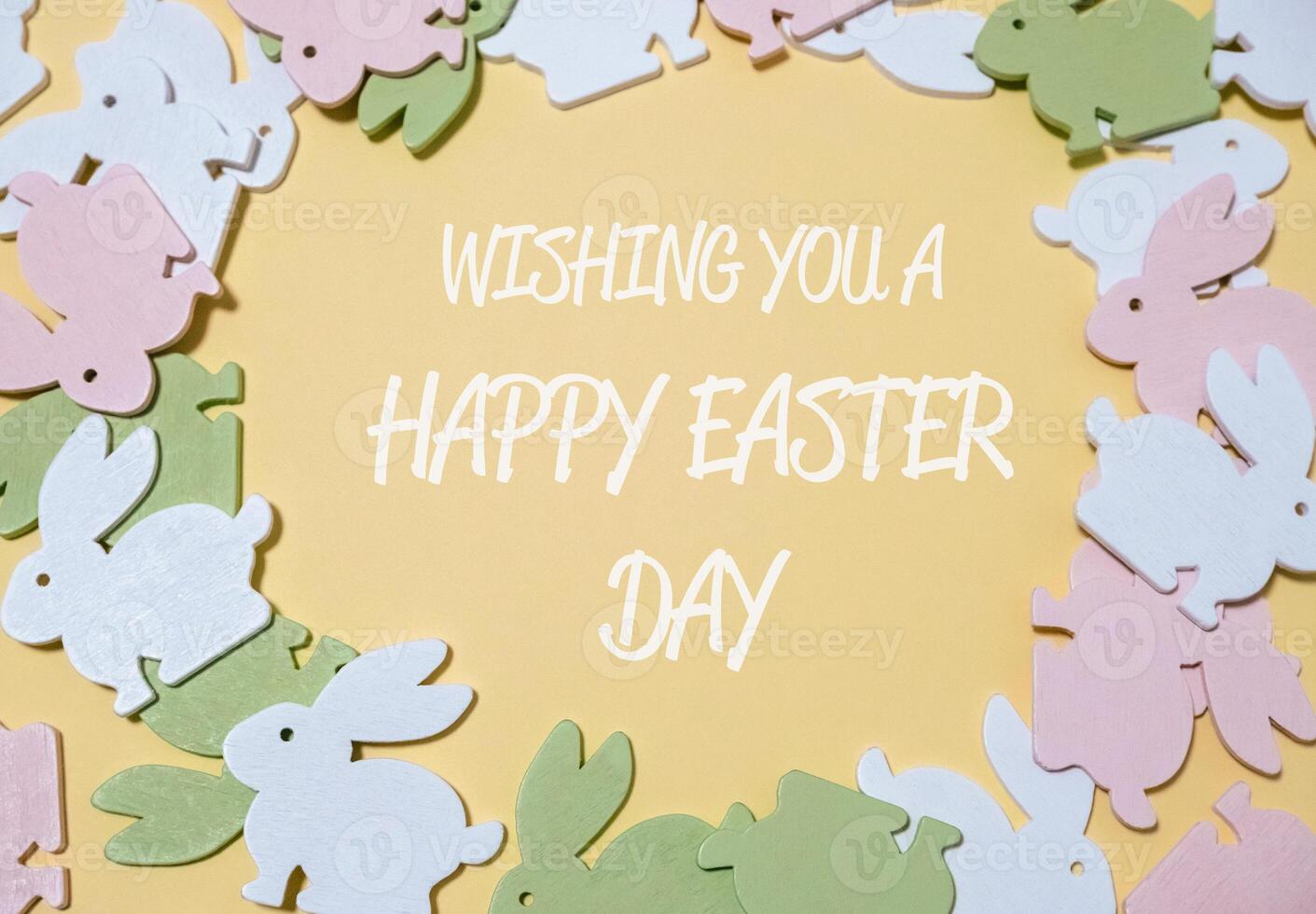 Picture of Easter bunnies with a message wishing you a happy Easter day photo