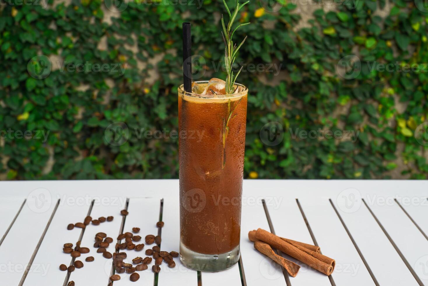 Espresso tonic drink on a wooden table with copy space photo