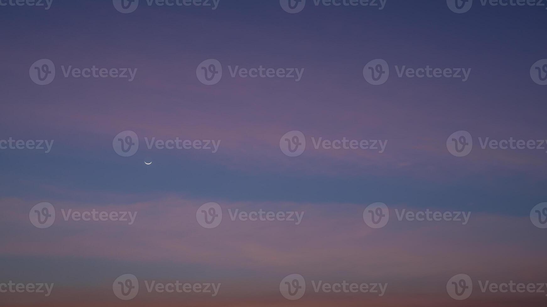 Evening sky, Beautiful clouds at dusk over the city, Moon and star, Nature background, Beautiful dark sky and bright white stars, Colorful clouds in summer, Peaceful and beautiful sunset. photo
