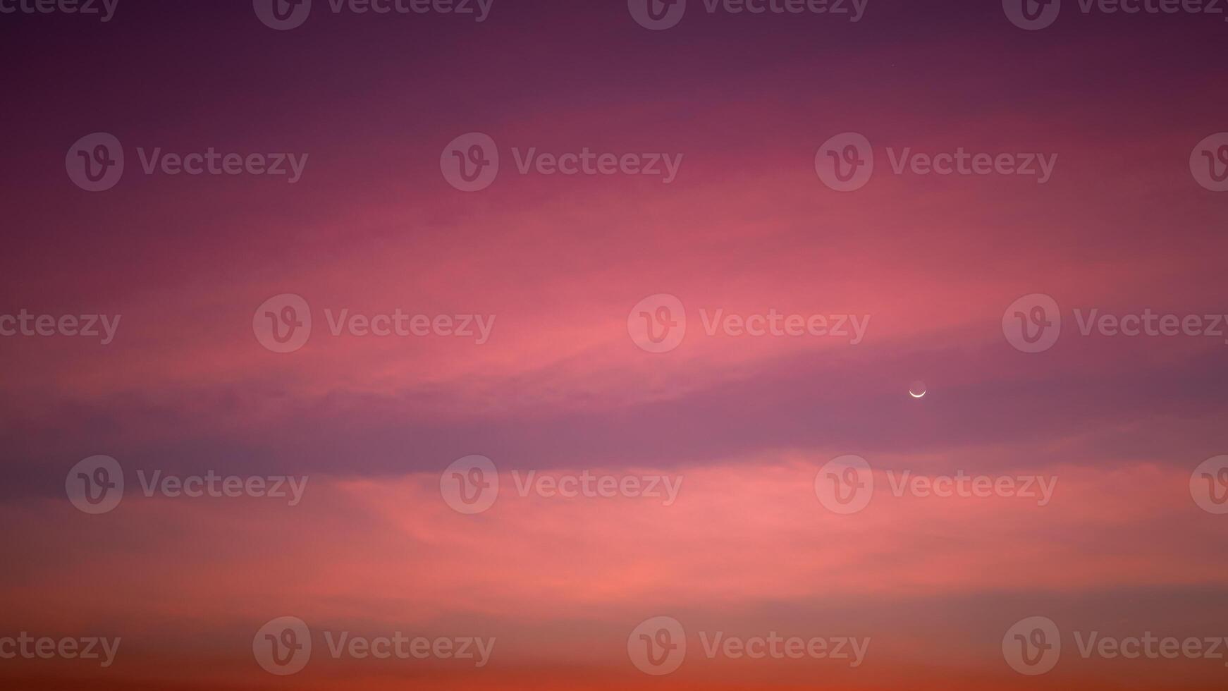 Beautiful clouds at dusk over the city, Moon and star, Nature background, Beautiful dark sky and bright white stars, Colorful clouds in summer, Peaceful and beautiful sunset. photo
