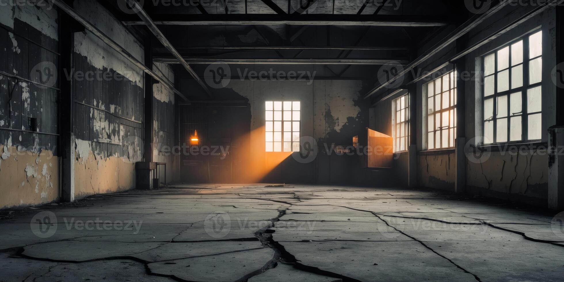 Dark and Atmospheric Interior of an Abandoned Warehouse with Concrete Floor and Wooden Beams. photo