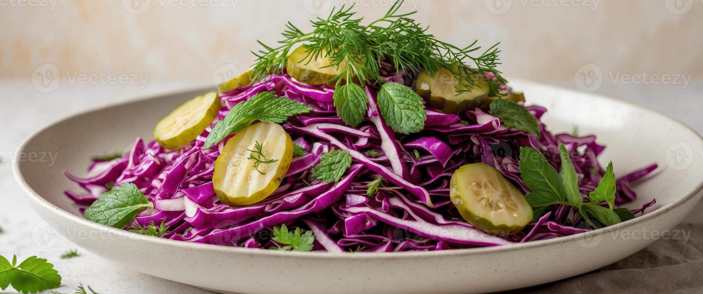 Vibrant red cabbage salad with pickles and fresh herbs. photo