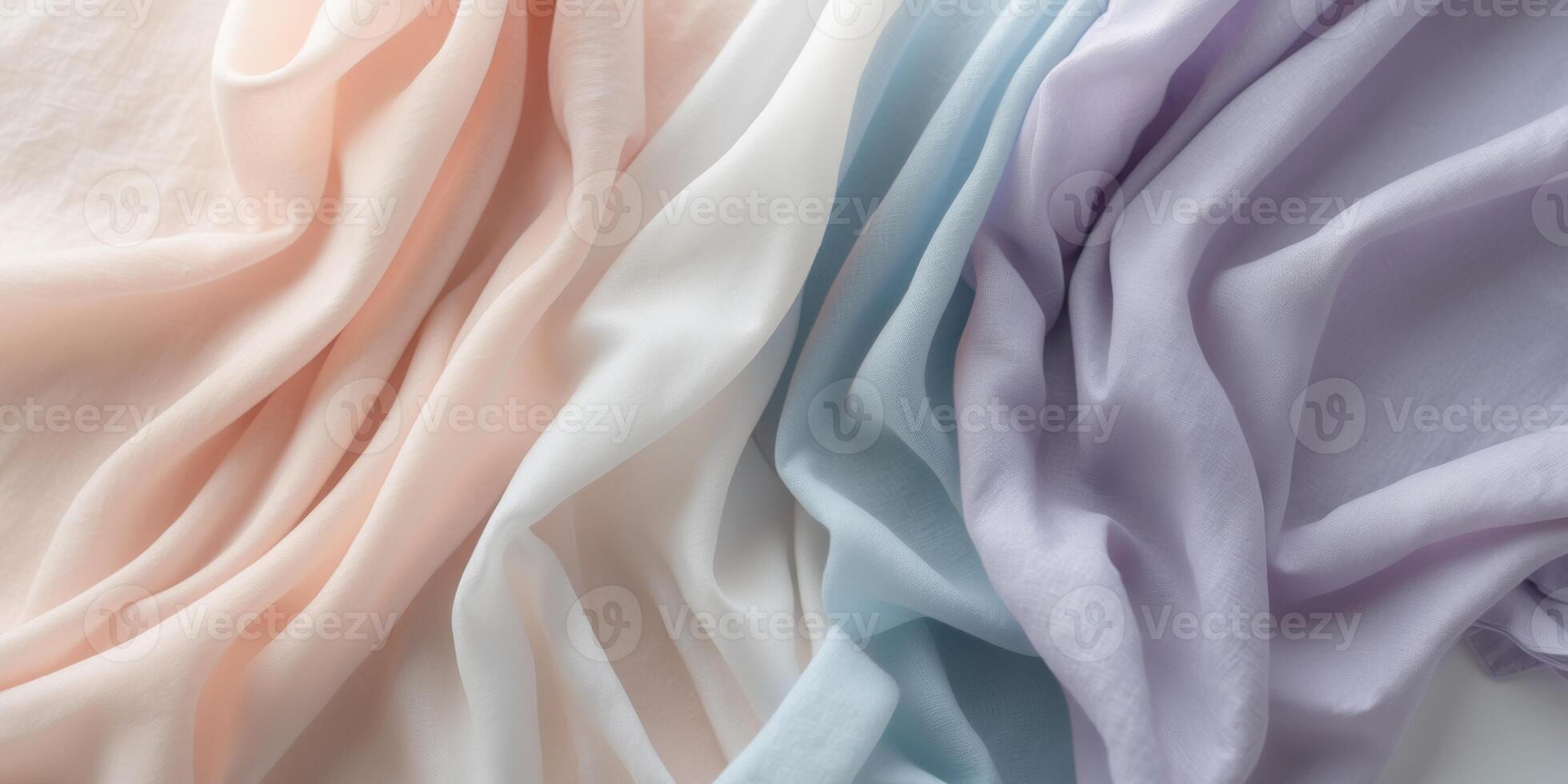 Soft flowing fabric in pastel colors creating an elegant background for creative projects and designs. photo
