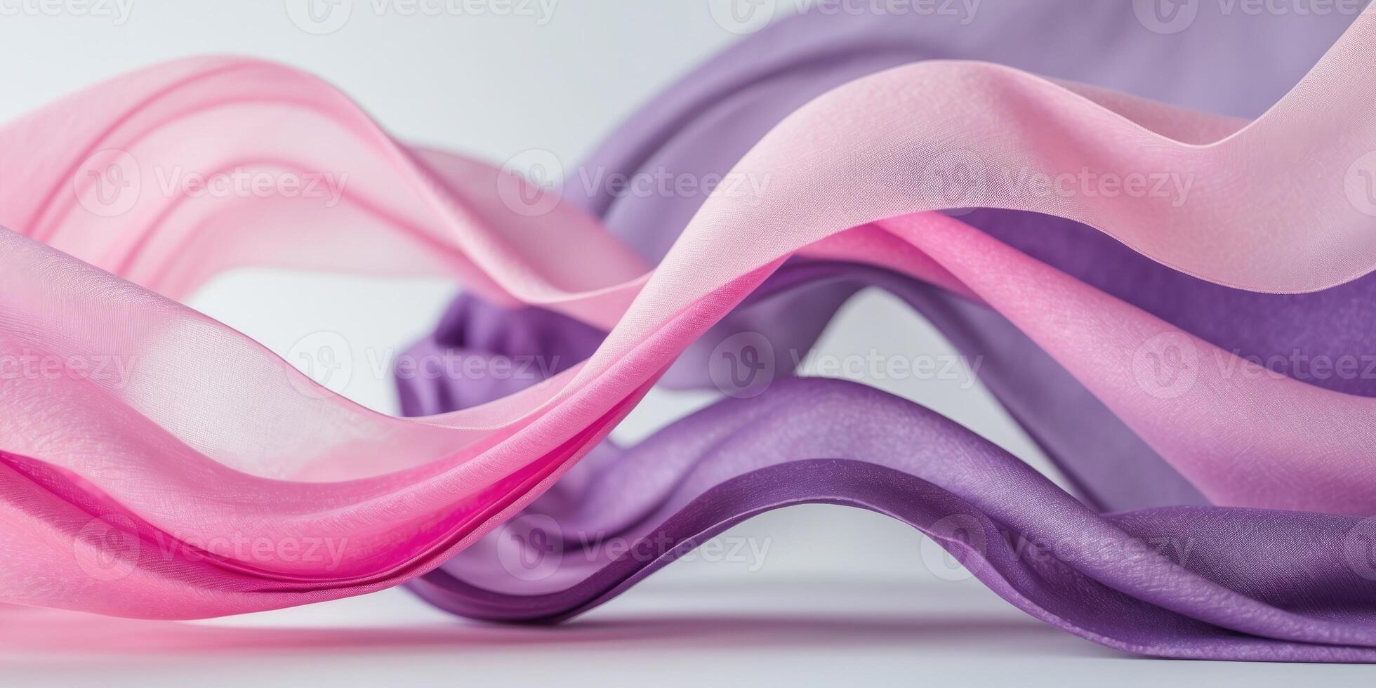 Abstract Pink and Purple Fabric Swirls Flowing Gracefully. photo