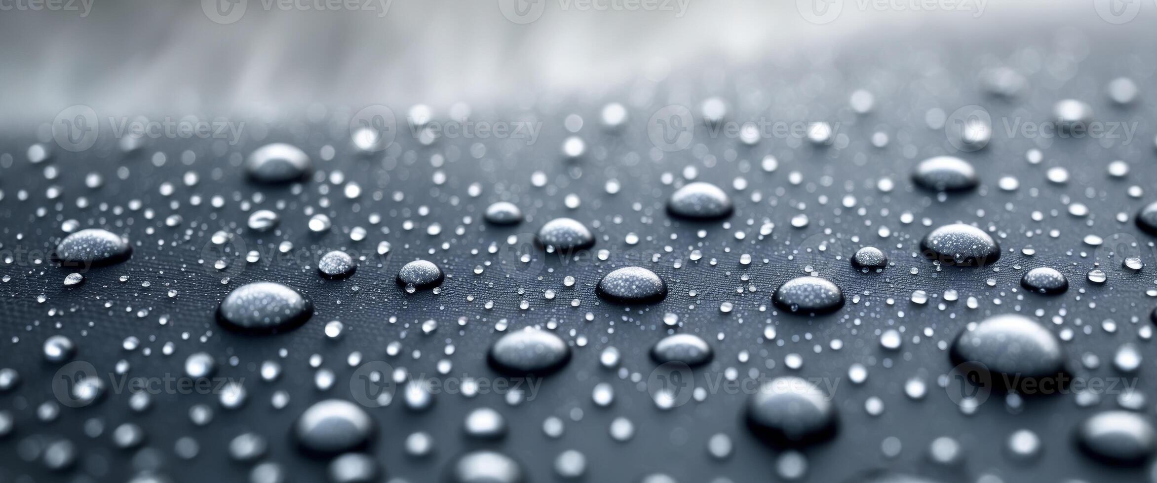 Close up picture of waterproof fabric with water droplets on the fabric photo