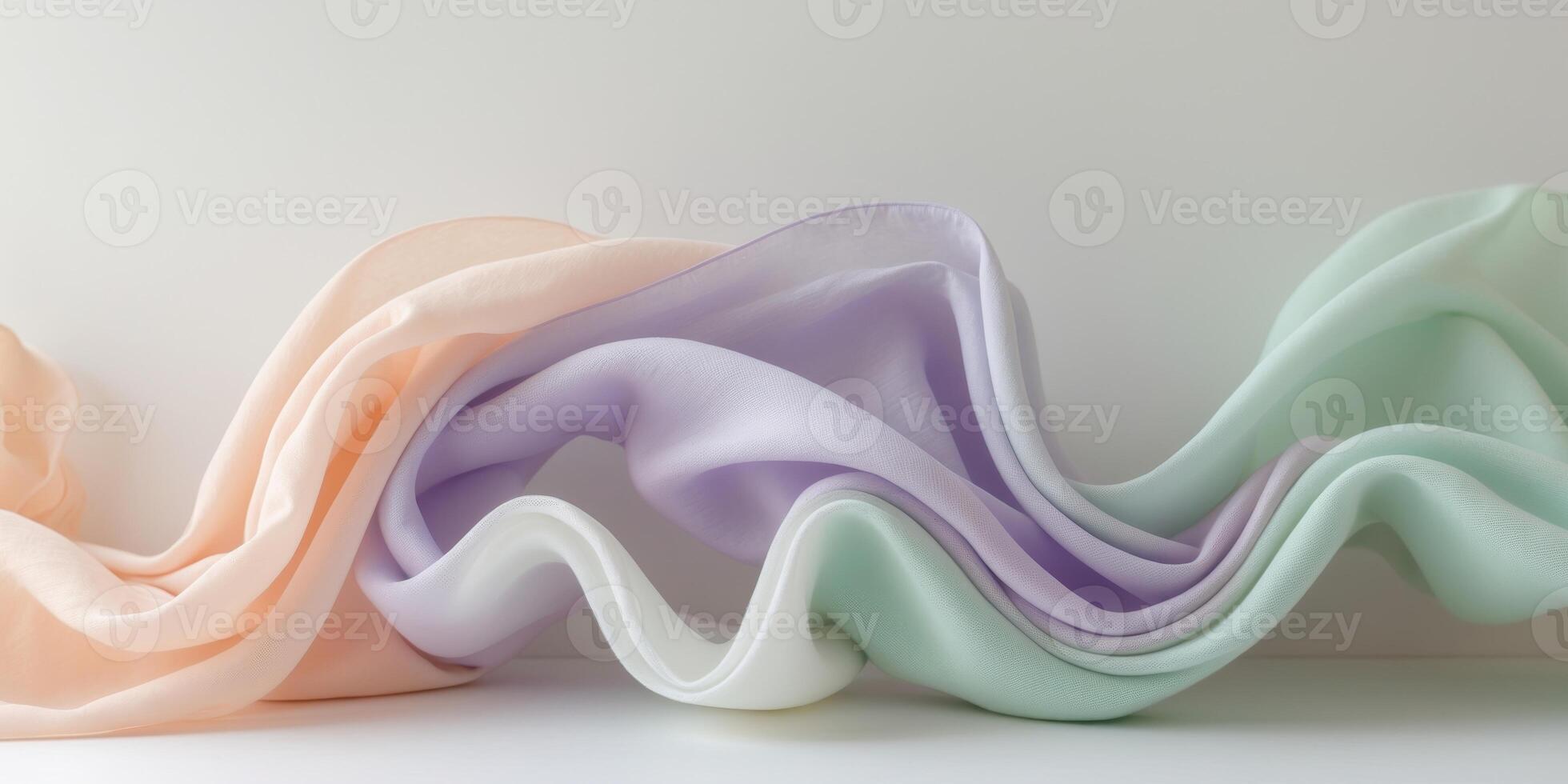 Abstract pastel colored flowing fabric art. photo