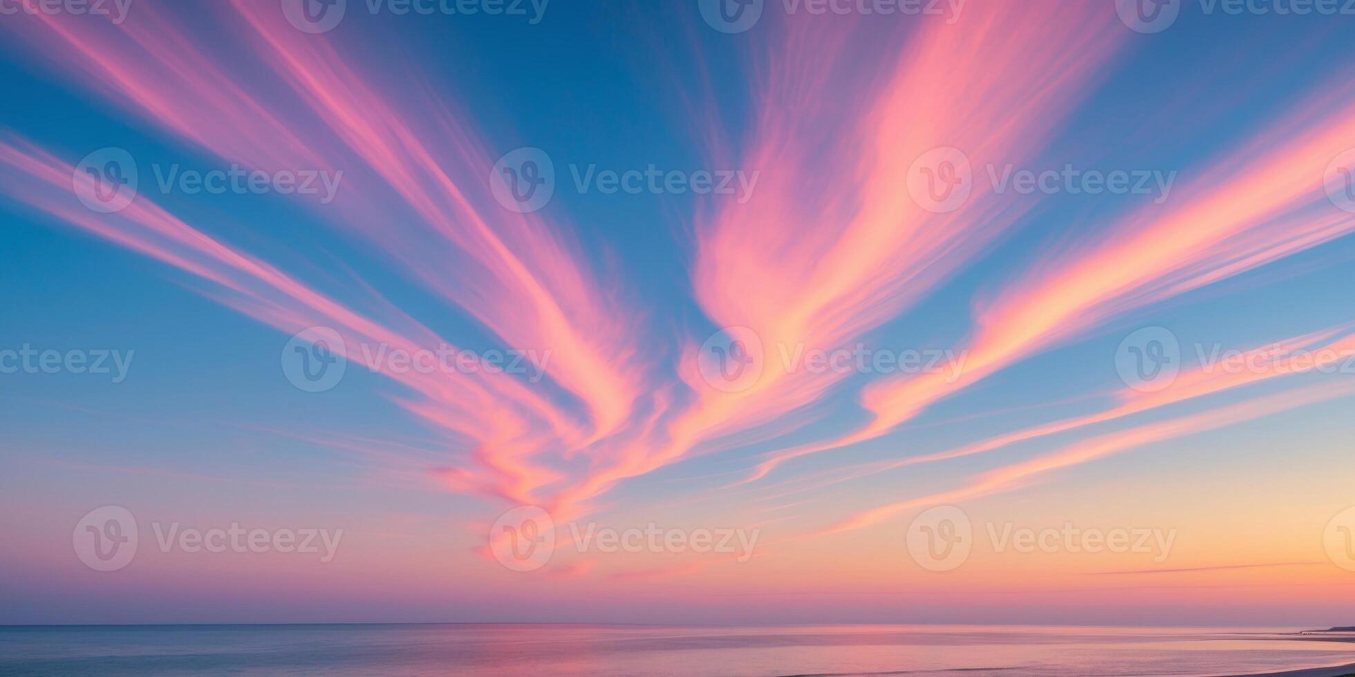 Colorful clouds appear in the sky during a serene dusk near a coastal area photo