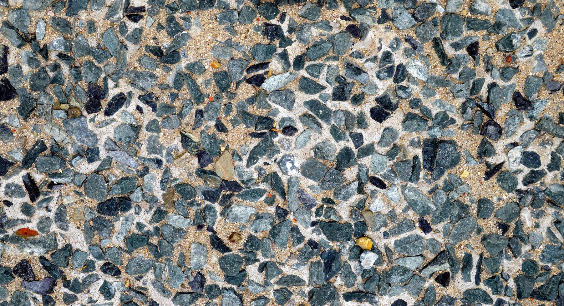 Background made of gray and dark gray small stones photo