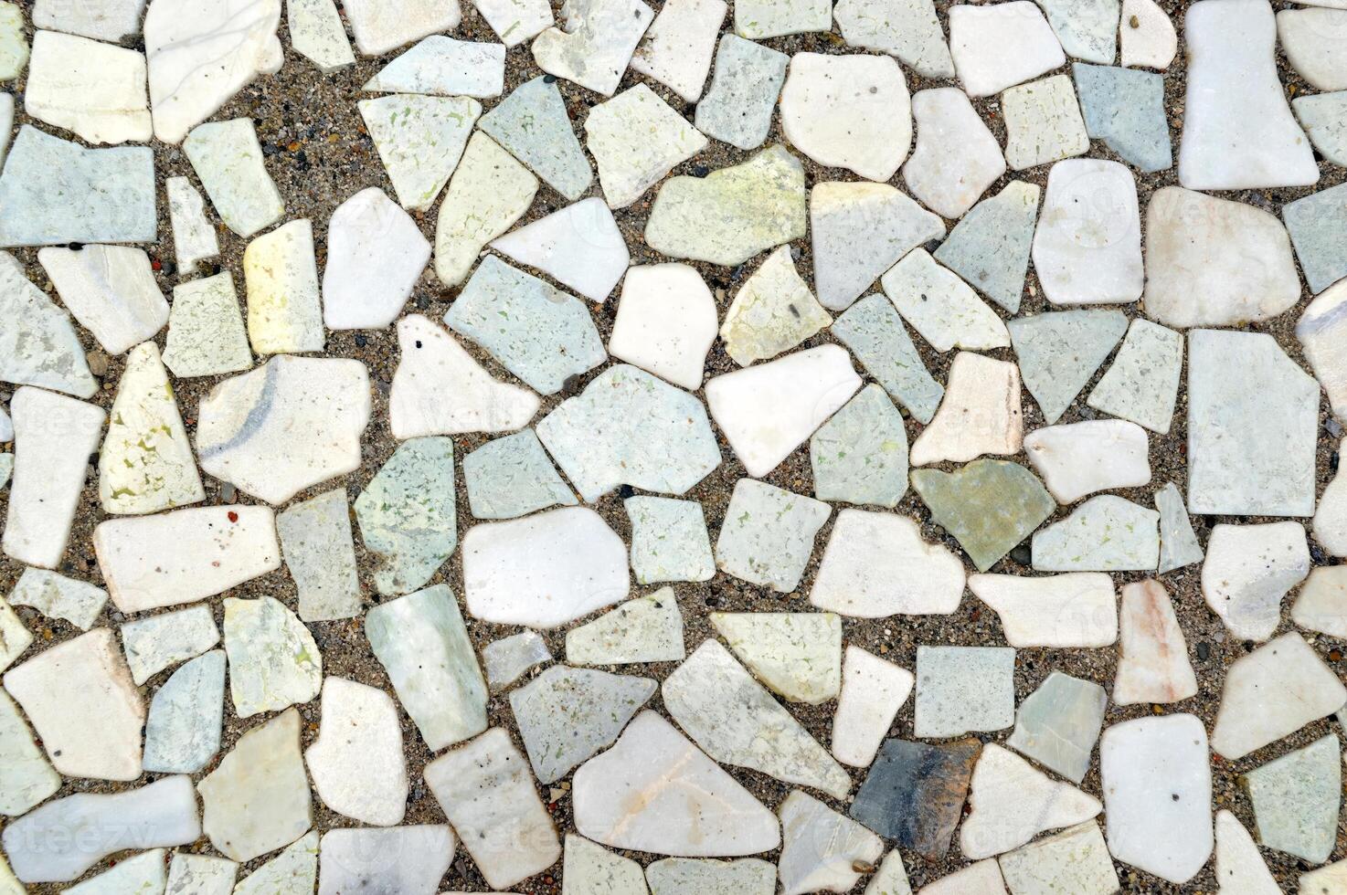 Background made of white and gray pieces of stones photo
