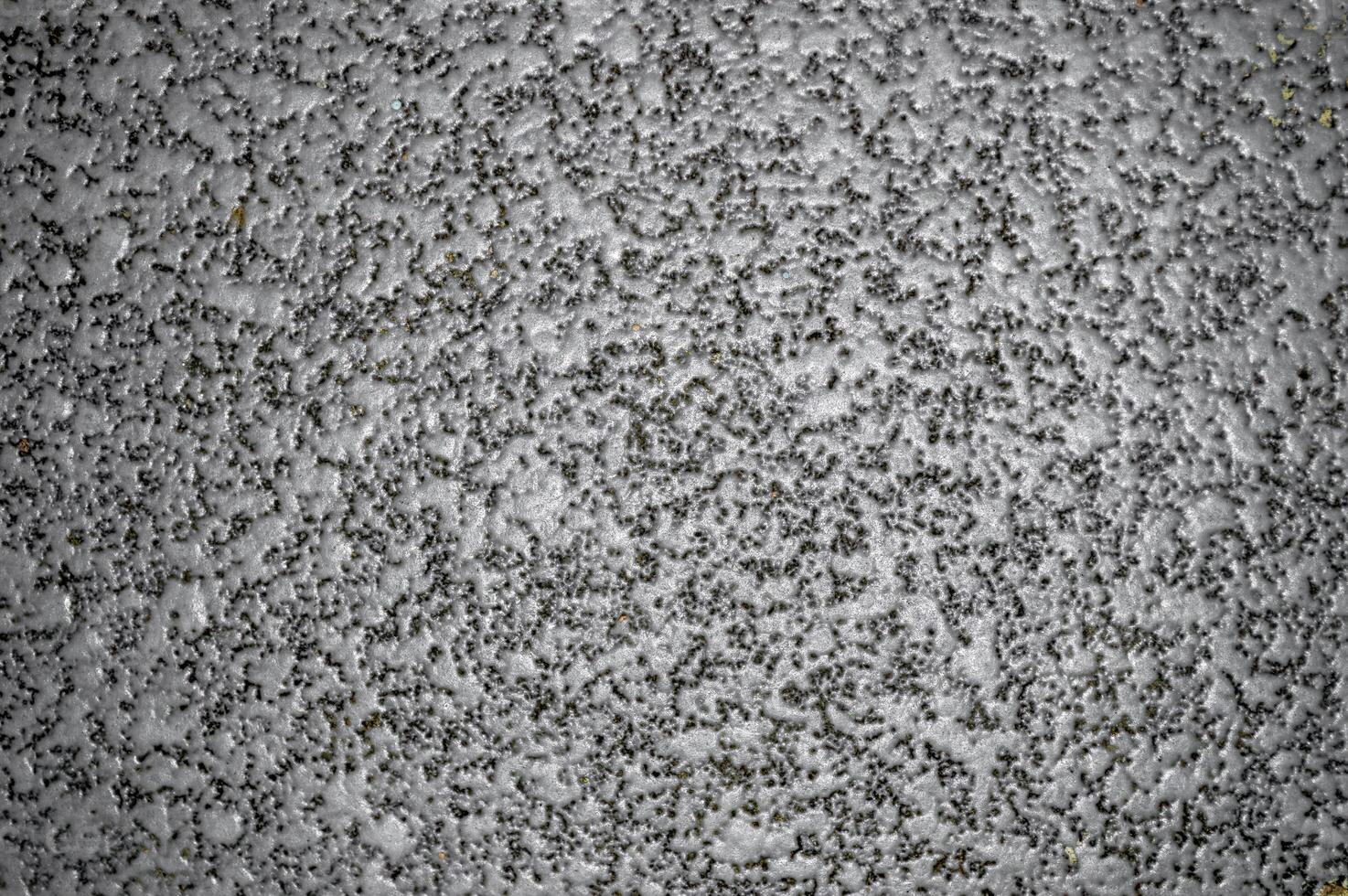 Monochromatic texture of stone surface tile used for floor or walls photo