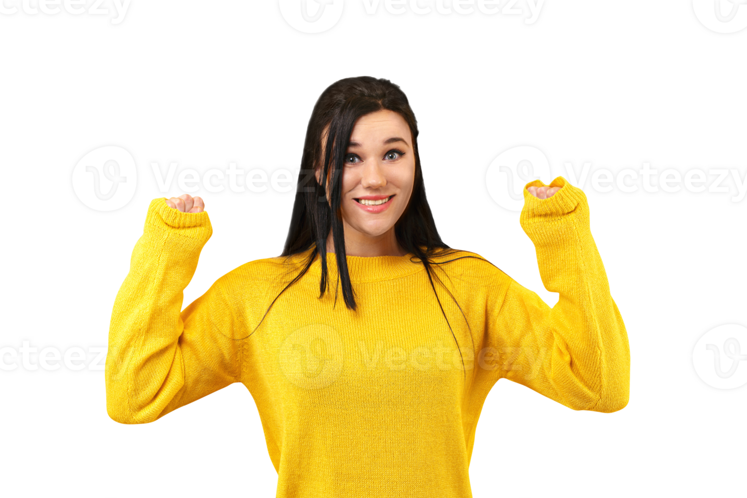 brunette girl rejoicing her success and victory clenching her fists with joy. Lucky woman in a yellow sweater smiling at the camera isolated on transparent background png