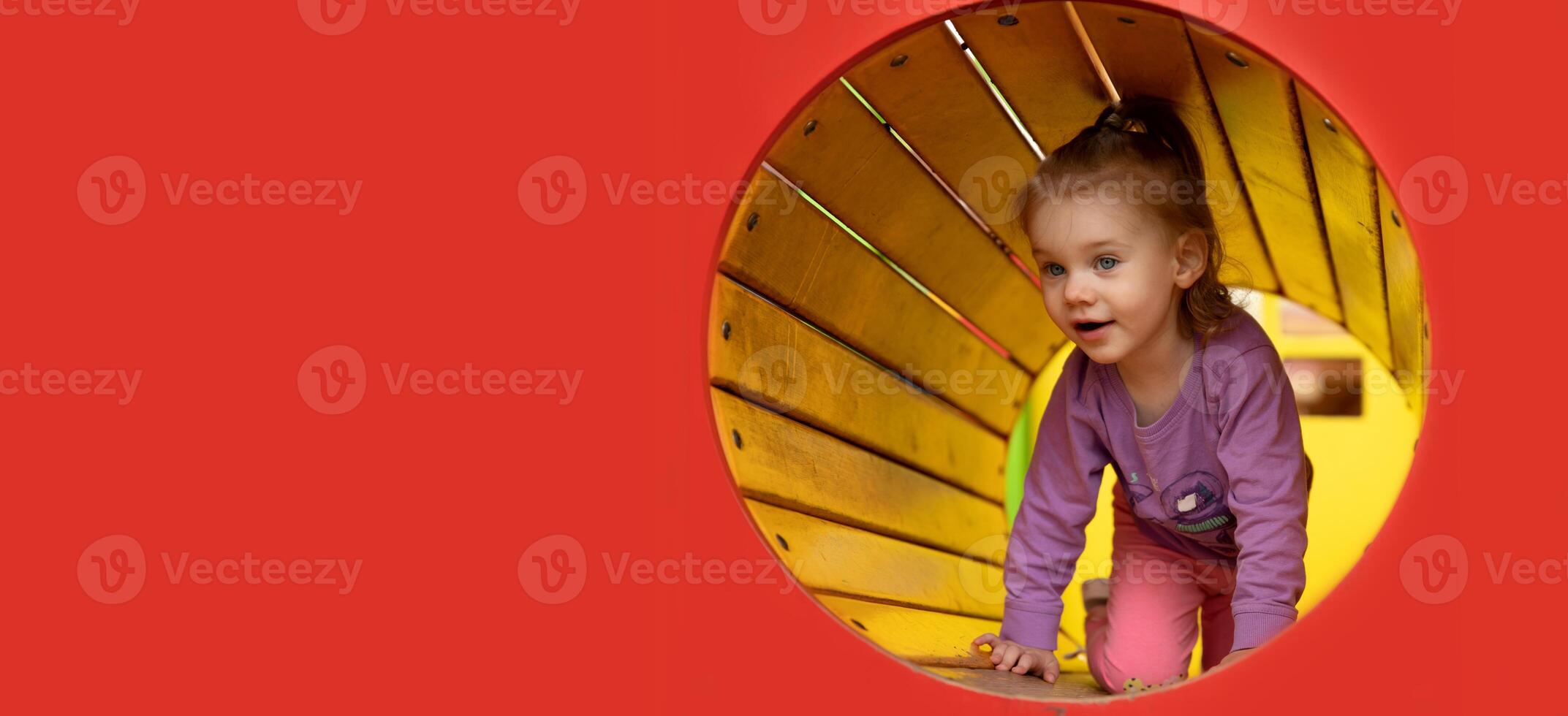 cute little girl in the playground panoramic photo