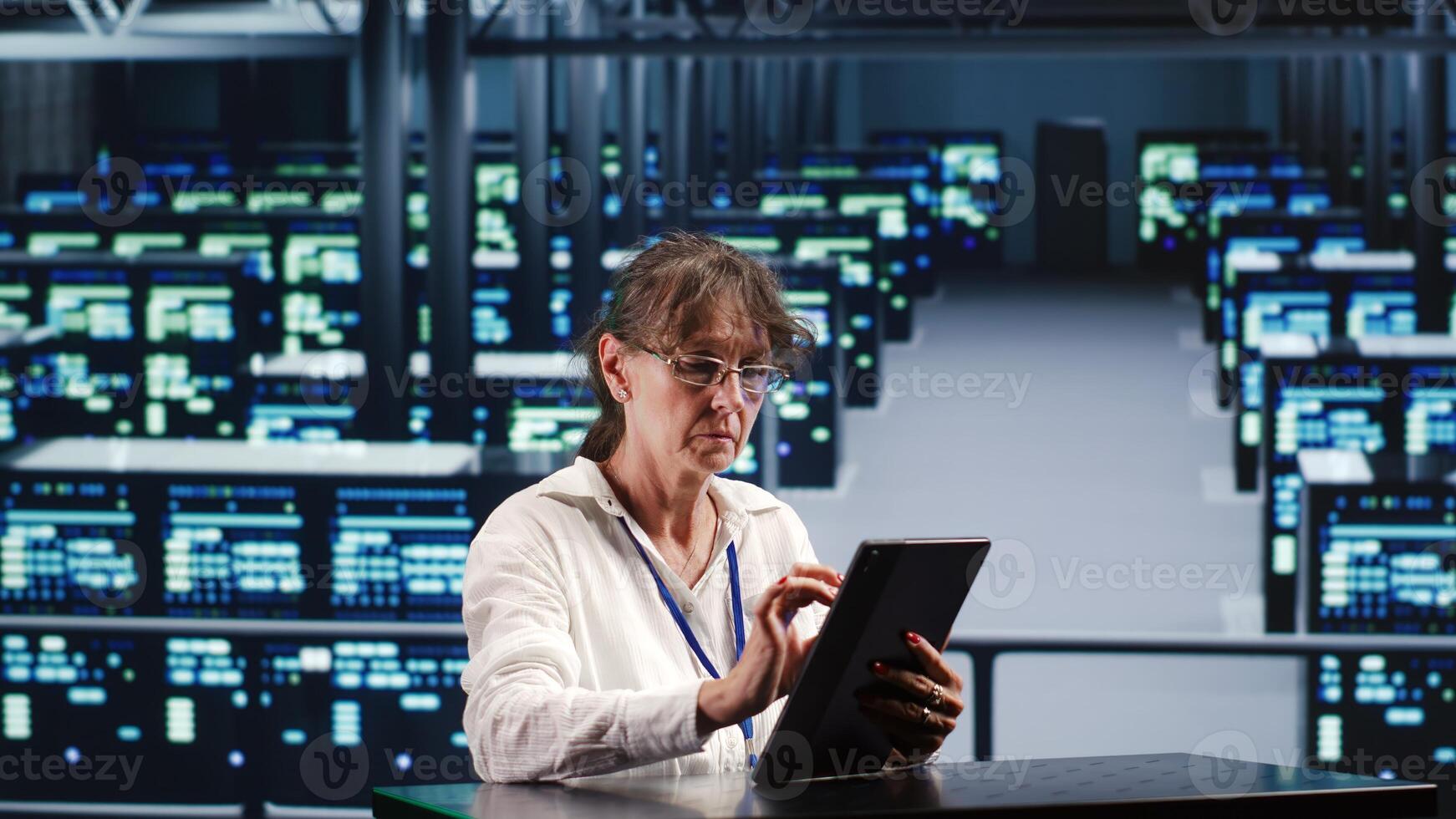 Competent manager in server hub housing high end devices capable of quickly and efficiently performing complex computations and data analysis, using tablet to end concerns photo