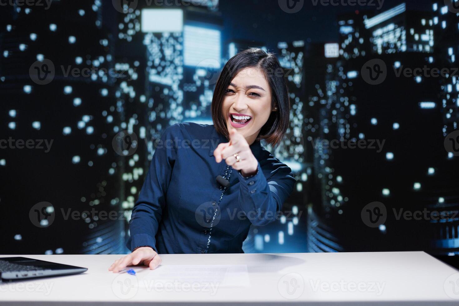 TV reporter presenting breaking news topics, reporting on live broadcast tv channel for late night show. Asian media presenter creating reportage with daily events for exclusive content. photo