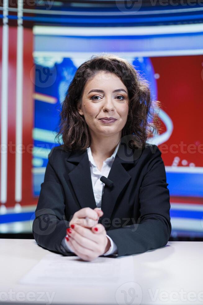 Journalist reading important headlines to present daily events and breaking news, broadcasting live information. Media tv reporter talking about international topics, television network. photo