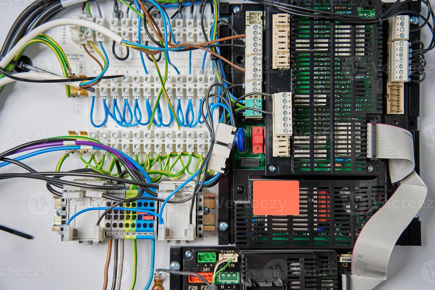 Wiring and circuit board inside electrical control panel photo