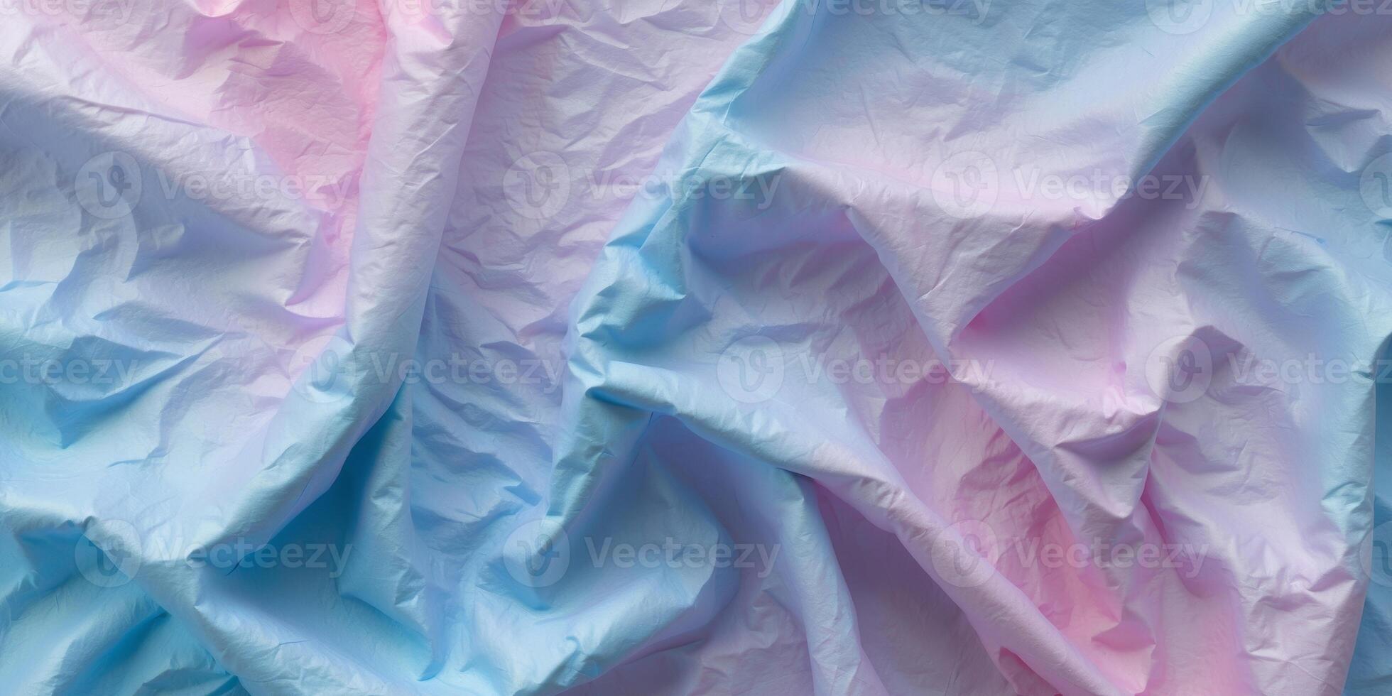 Crumpled blue and pink textured background with a gradient effect offers depth and visual intrigue for creative designs and compositions. photo