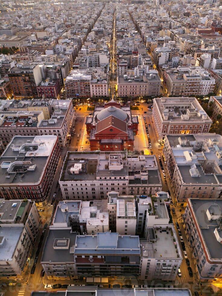 Aerial view of the Teatro Petruzzelli in Bari. The opera house is located in the city center, from which long streets and alleys radiate. The aerial view highlights the geometry of the city of Bari photo