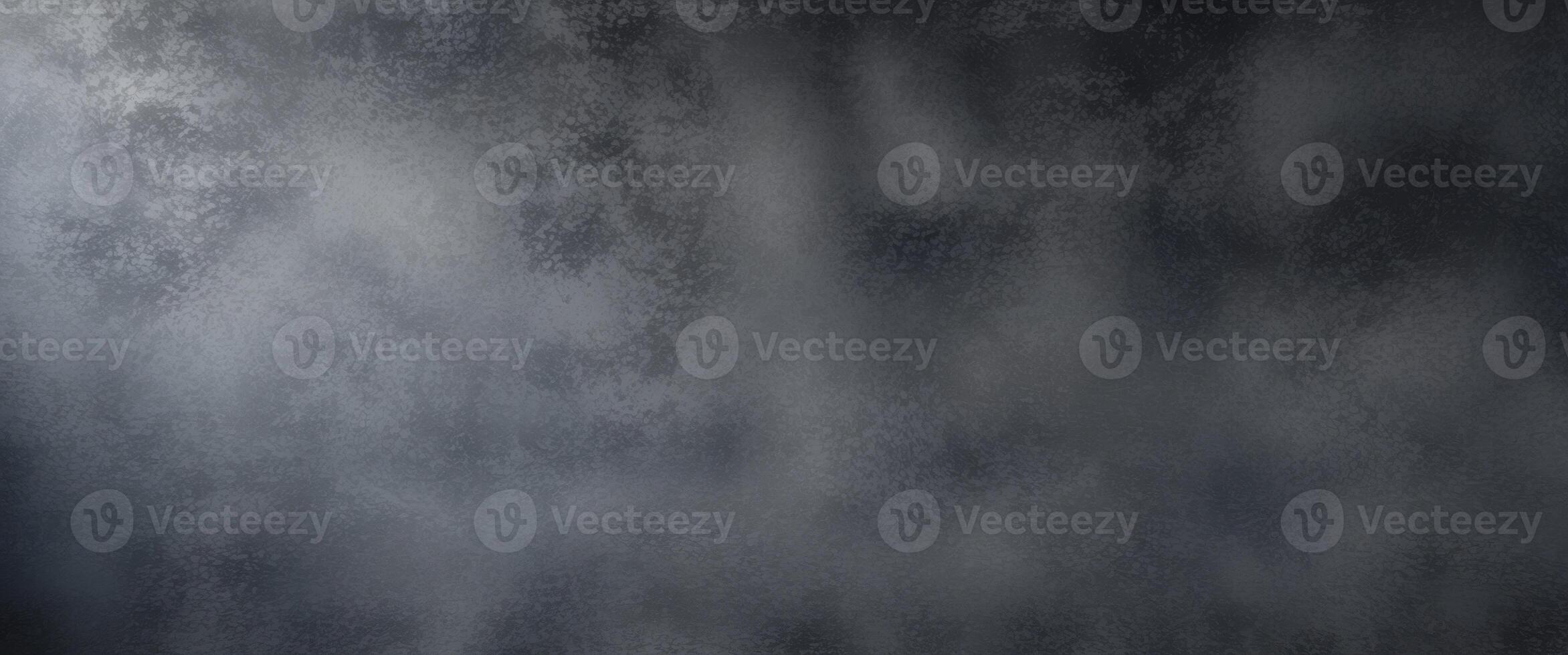 Versatile dark gray textured background with ample space for a variety of design projects photo