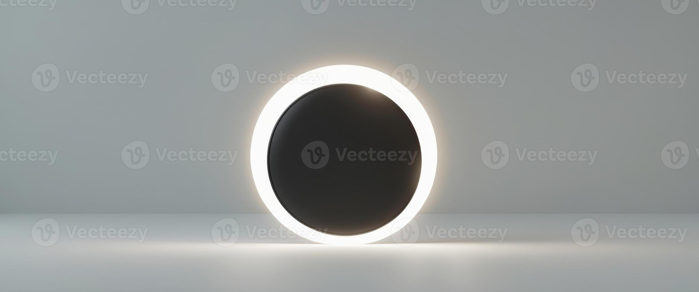 Studio image of a solar eclipse using a bright light and a black lens cap photo