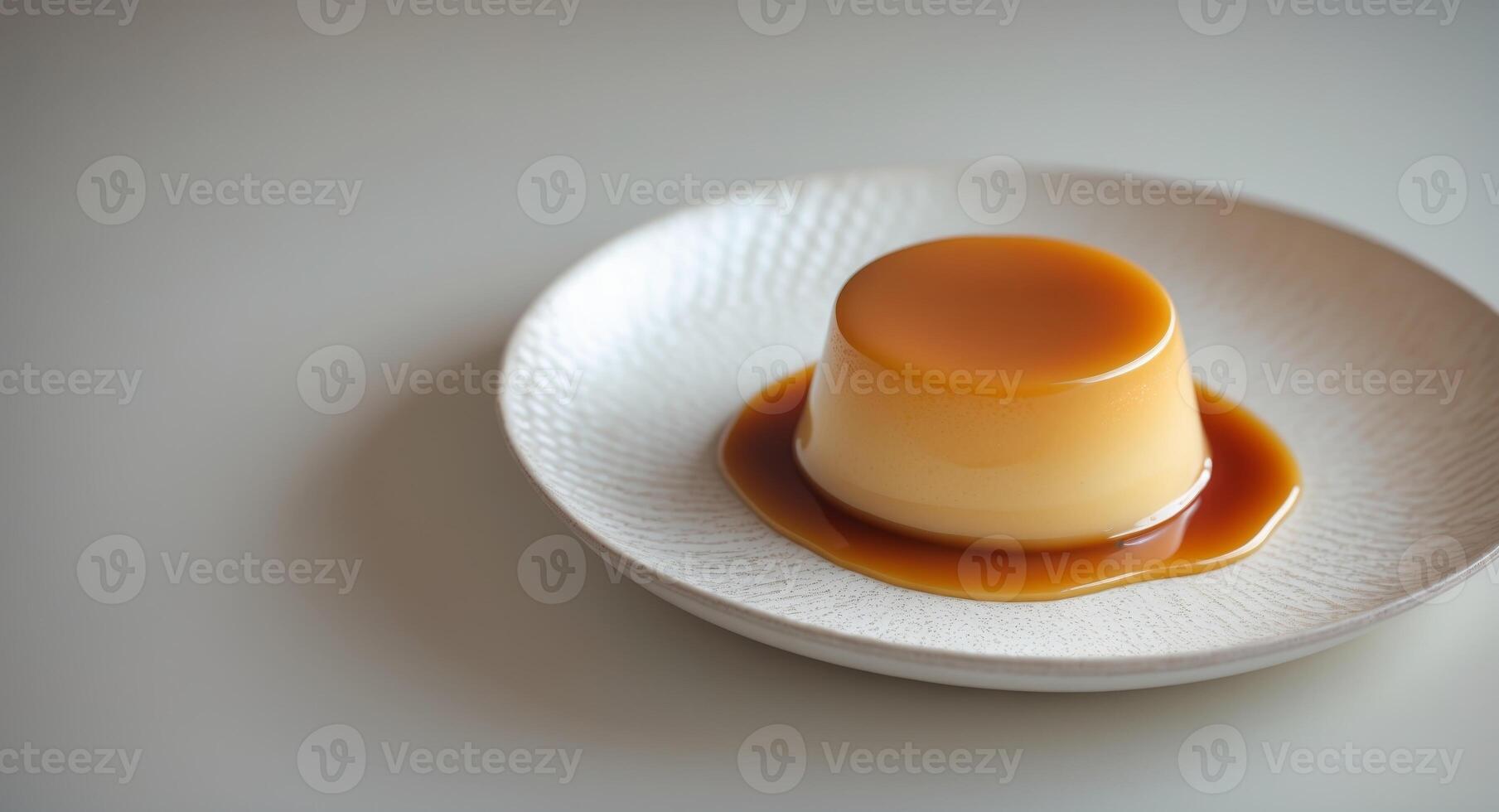Creamy caramel flan with glossy topping on white ceramic plate photo