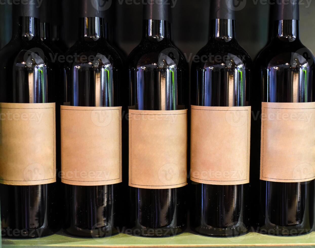 Homemade hibiscus wine on a wooden shelf photo