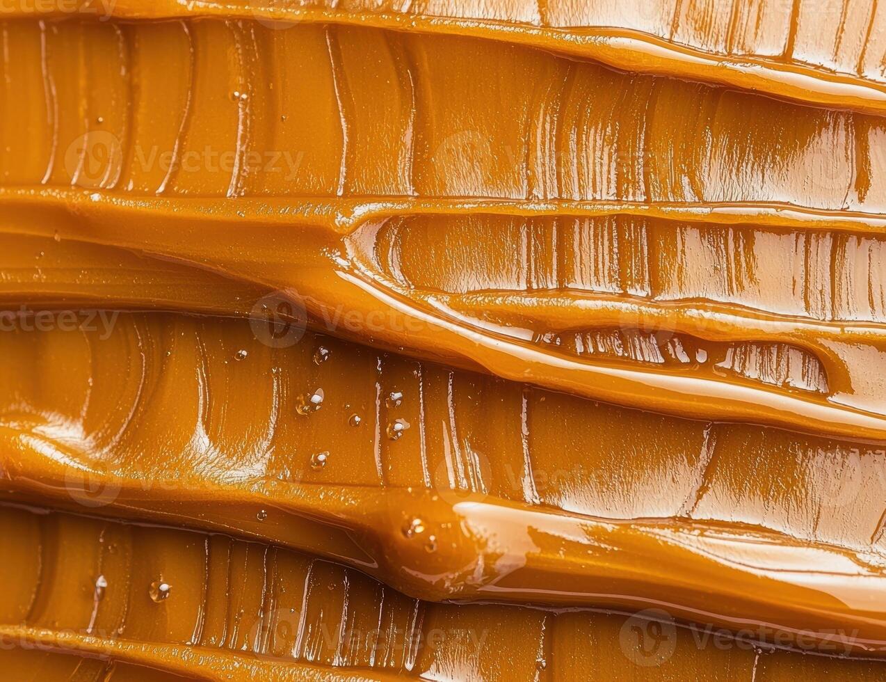 Close up of caramel sauce texture photo