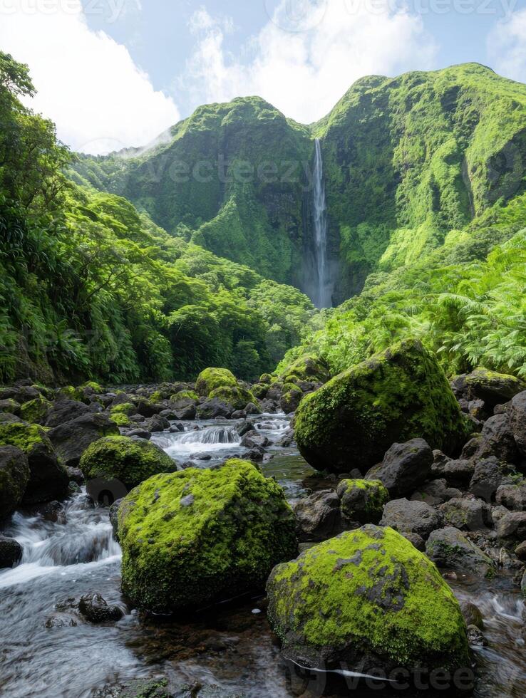 Lush green landscape with waterfall cascading down a mountainside photo