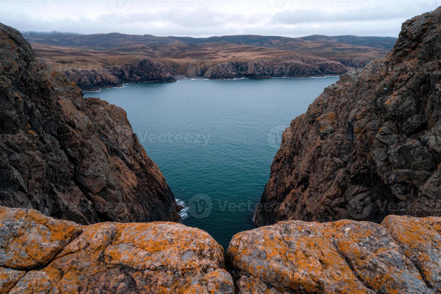Dramatic cliffs and ocean view from a high vantage point photo