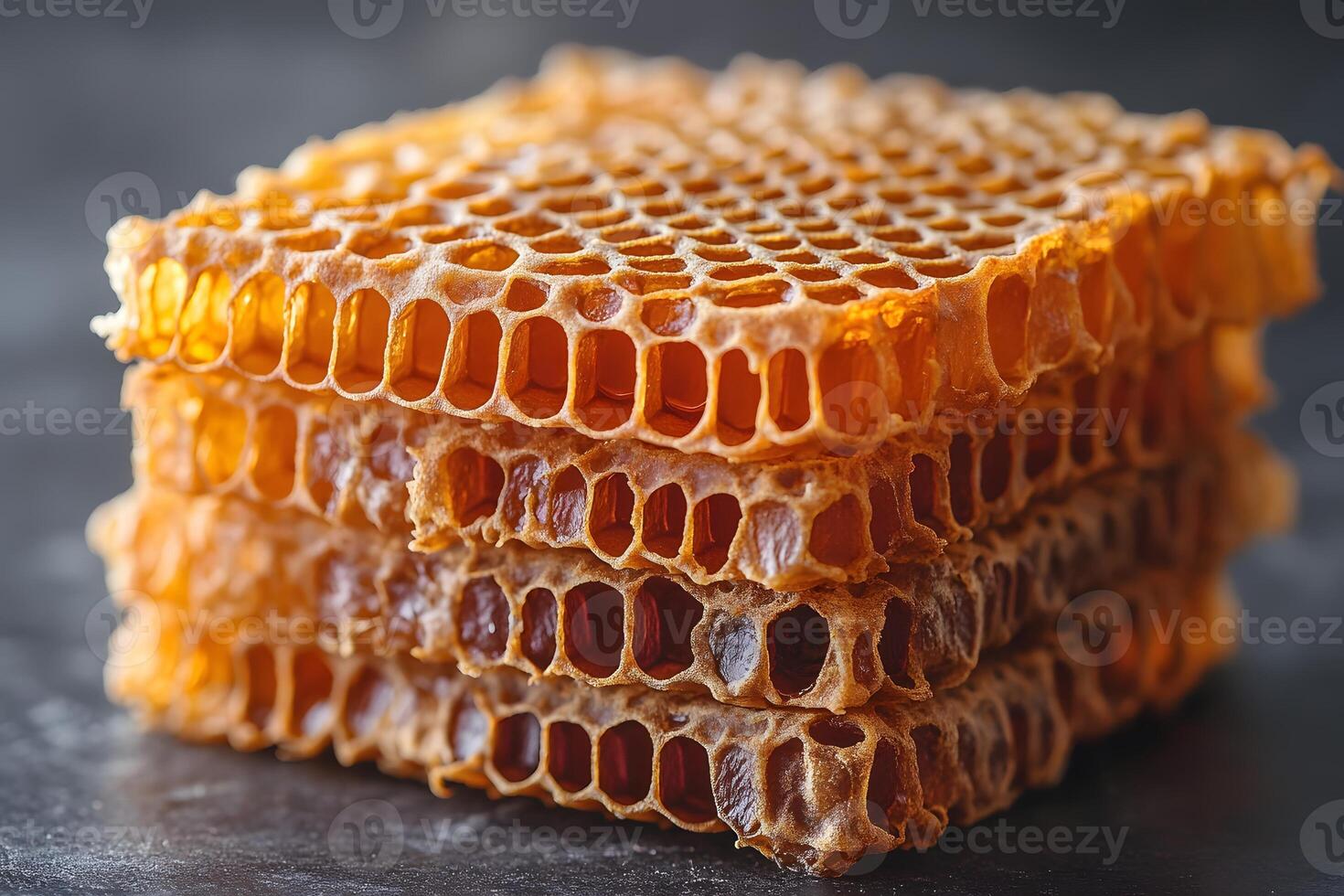 Honeycomb Stack with Golden Honey - Natural Sweetness and Healthy Living Concept photo