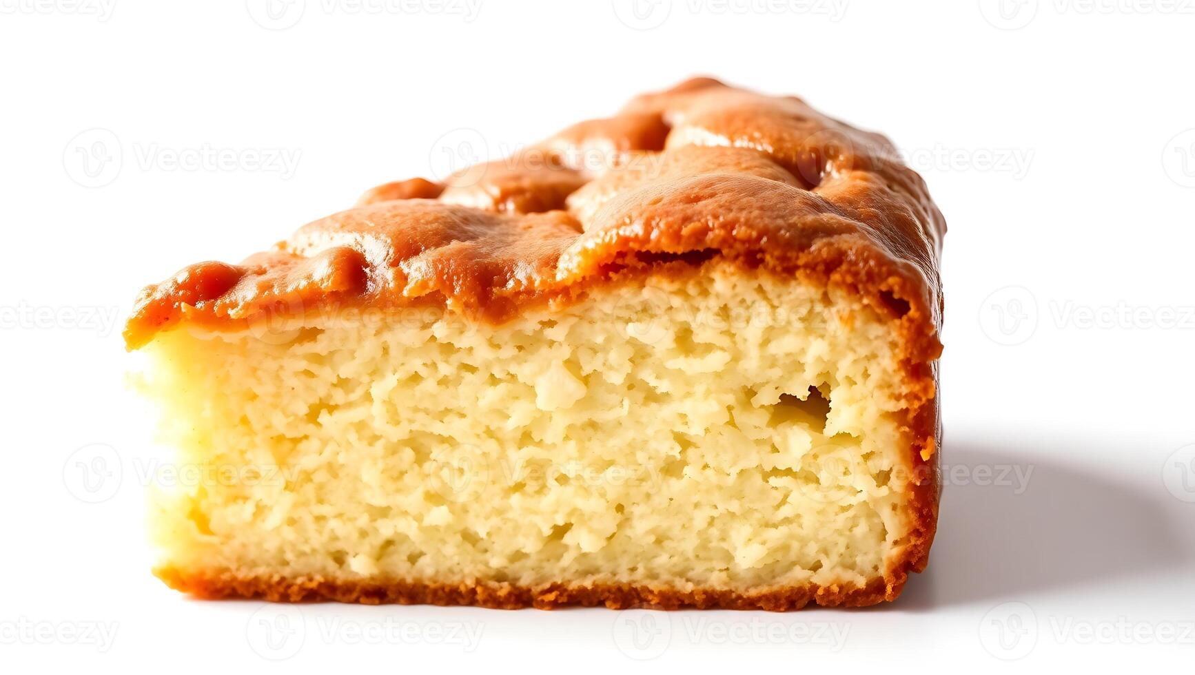 Simple cake slice showing moist texture and golden crust from baking process photo