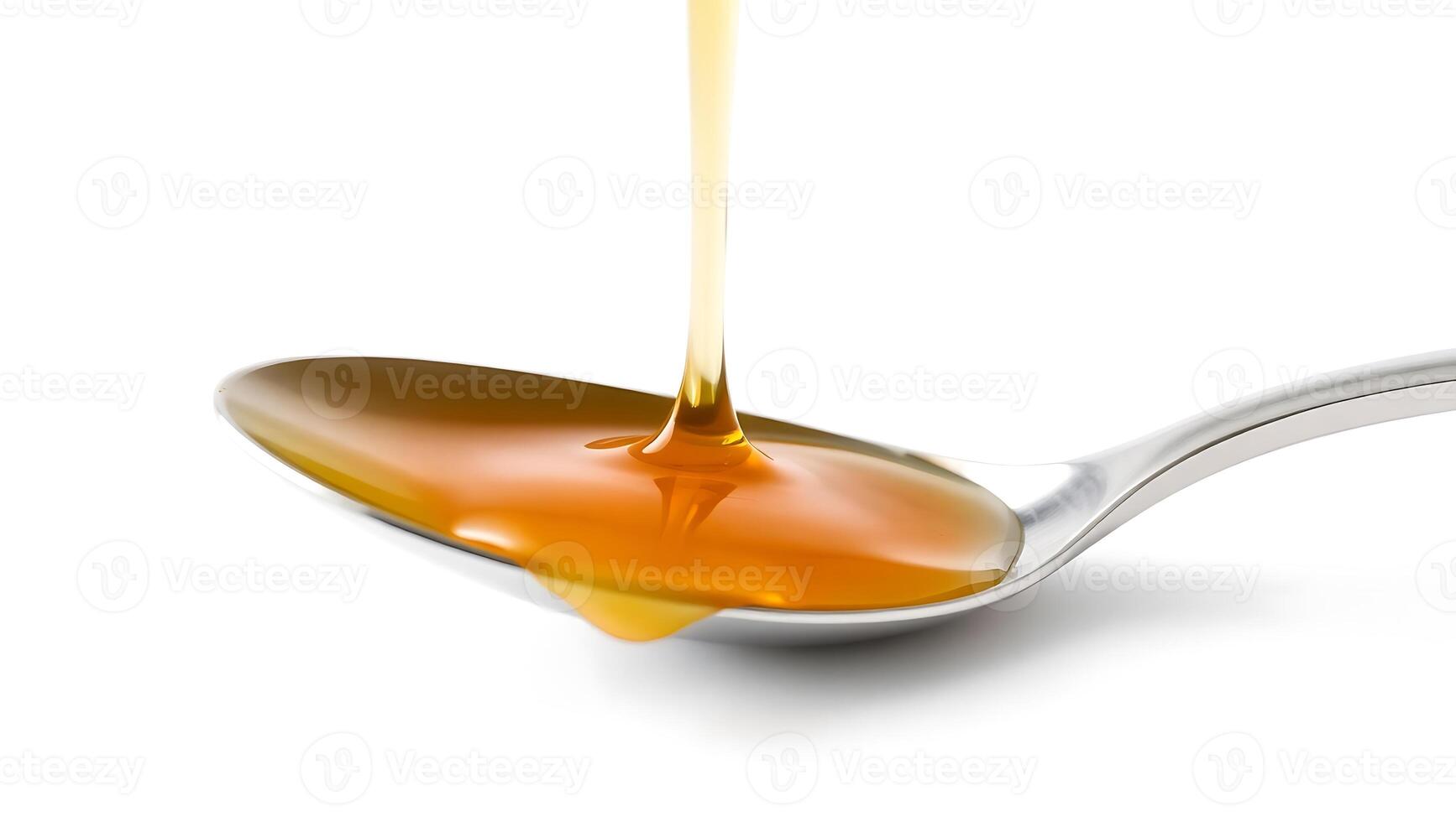 Honey pouring from a jar into a spoon with a smooth, glossy texture photo