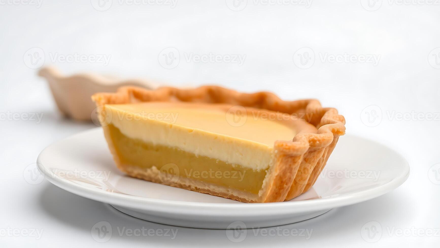 Delicious dessert slice with creamy filling on a plate photo