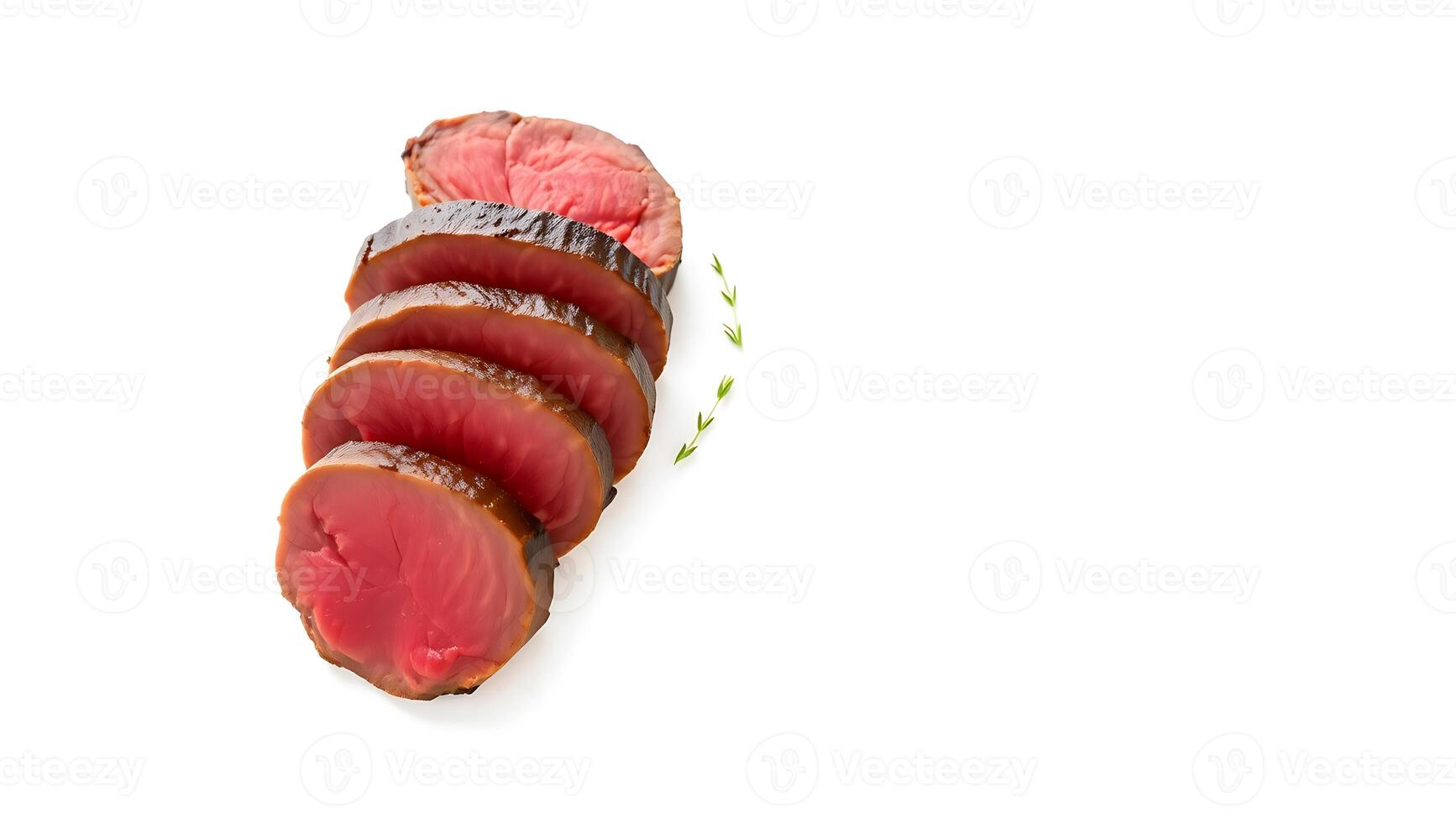 Sliced cured meat with herbs on a plain surface photo