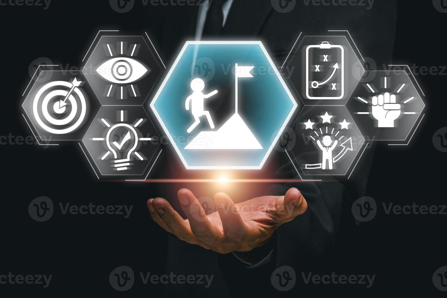 Visual representation of achieving goals with icons symbolizing success, motivation, and strategic planning in a business setting. photo