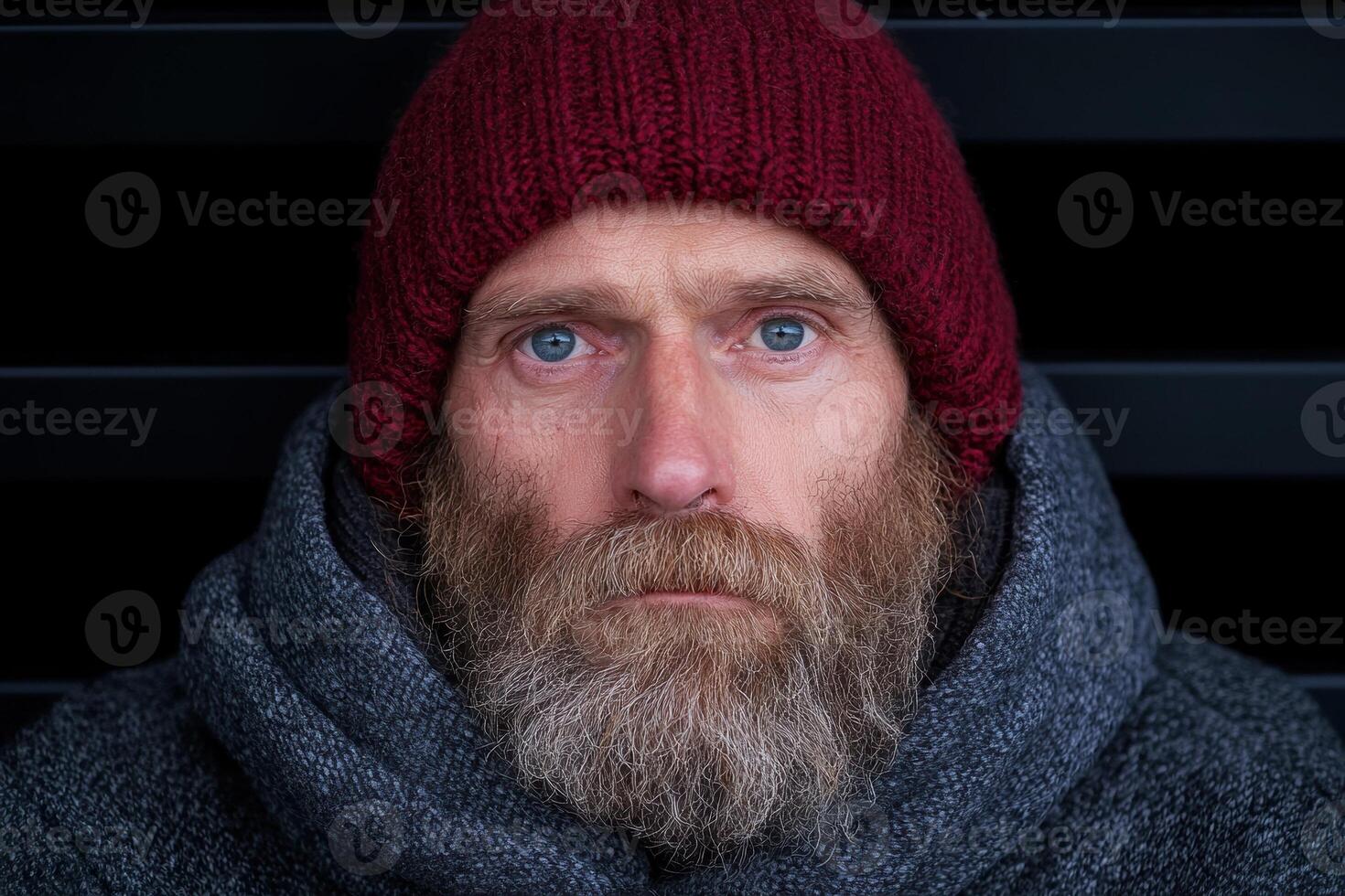 Portrait of a man with a beard wearing a beanie photo