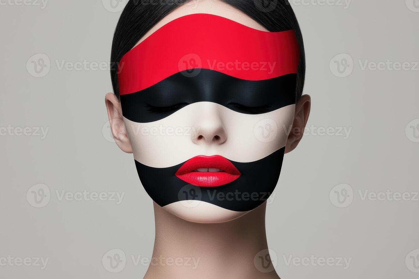 Woman with abstract red and black face paint photo
