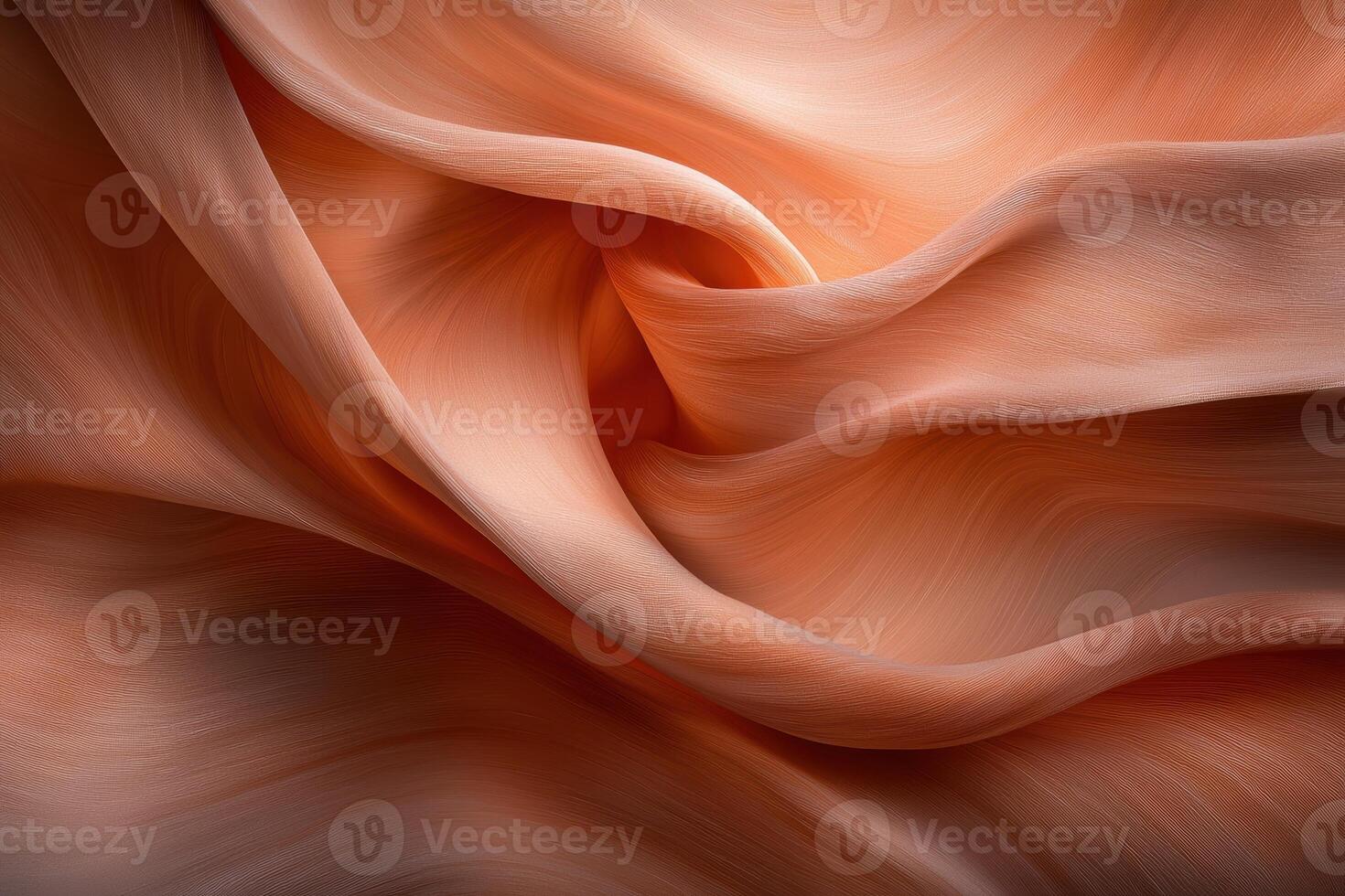 Abstract peach fabric with flowing folds and soft texture photo