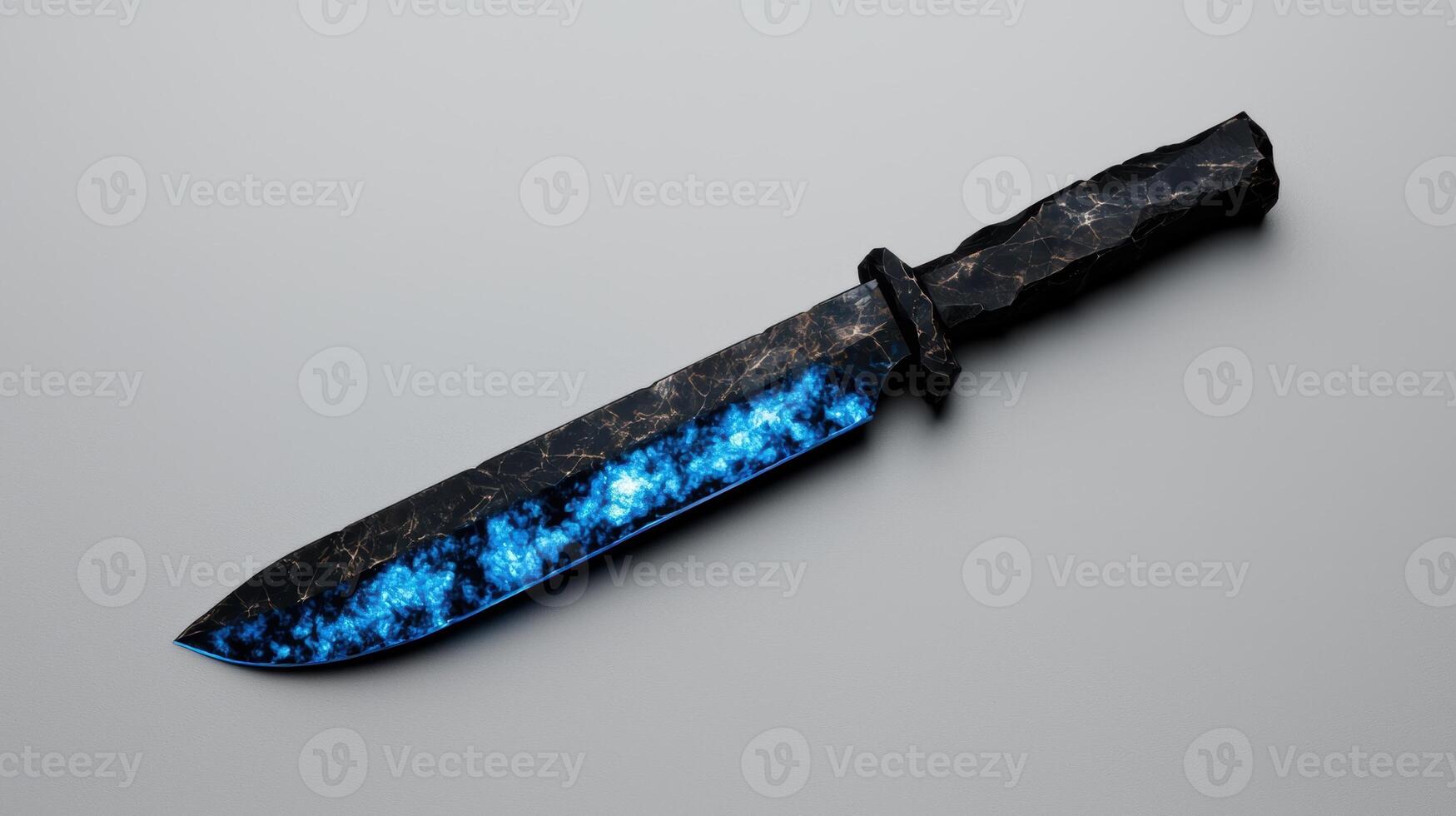 A fantasy dagger with a glowing blue blade photo