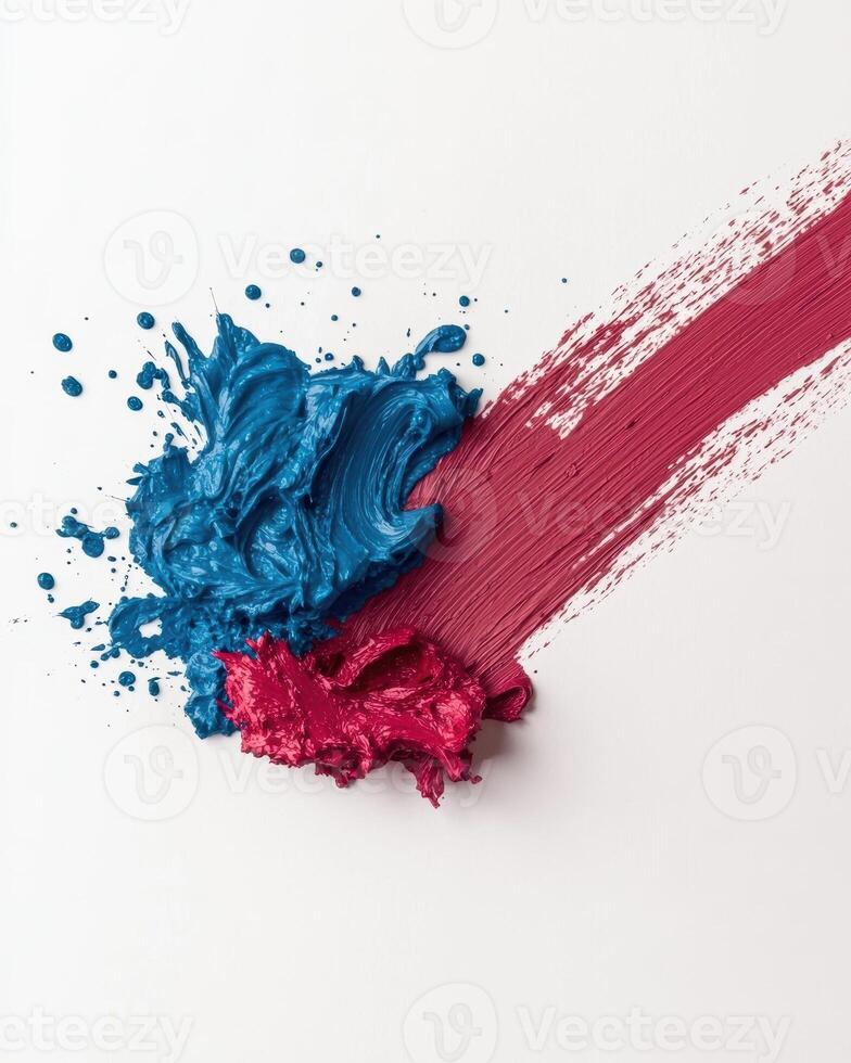 Abstract paint strokes in blue and red on a white background photo