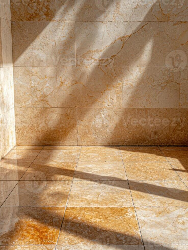 Sunlight streams across a marble tiled floor and wall photo