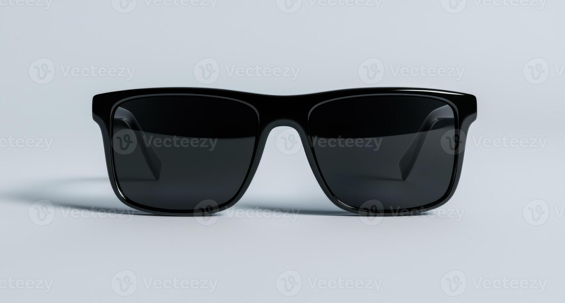 A pair of black sunglasses on a white background photo