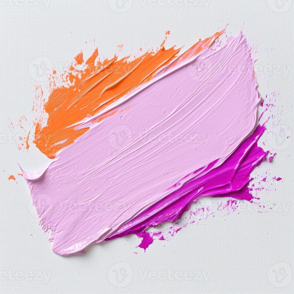 Abstract paint strokes in orange, pink and magenta on canvas photo