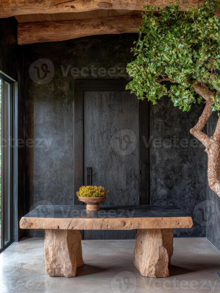Rustic interior design with stone table and tree photo
