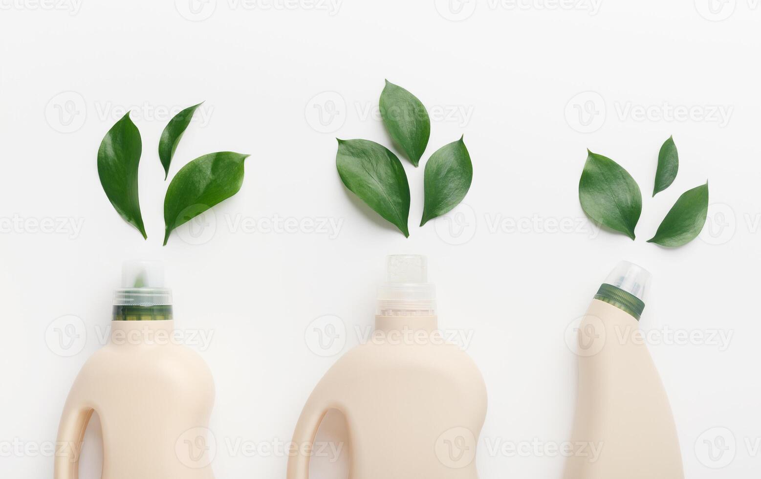 Choose bio concept. Different liquid detergents for wet home cleaning with quality and safety sign natural leaves, white background photo